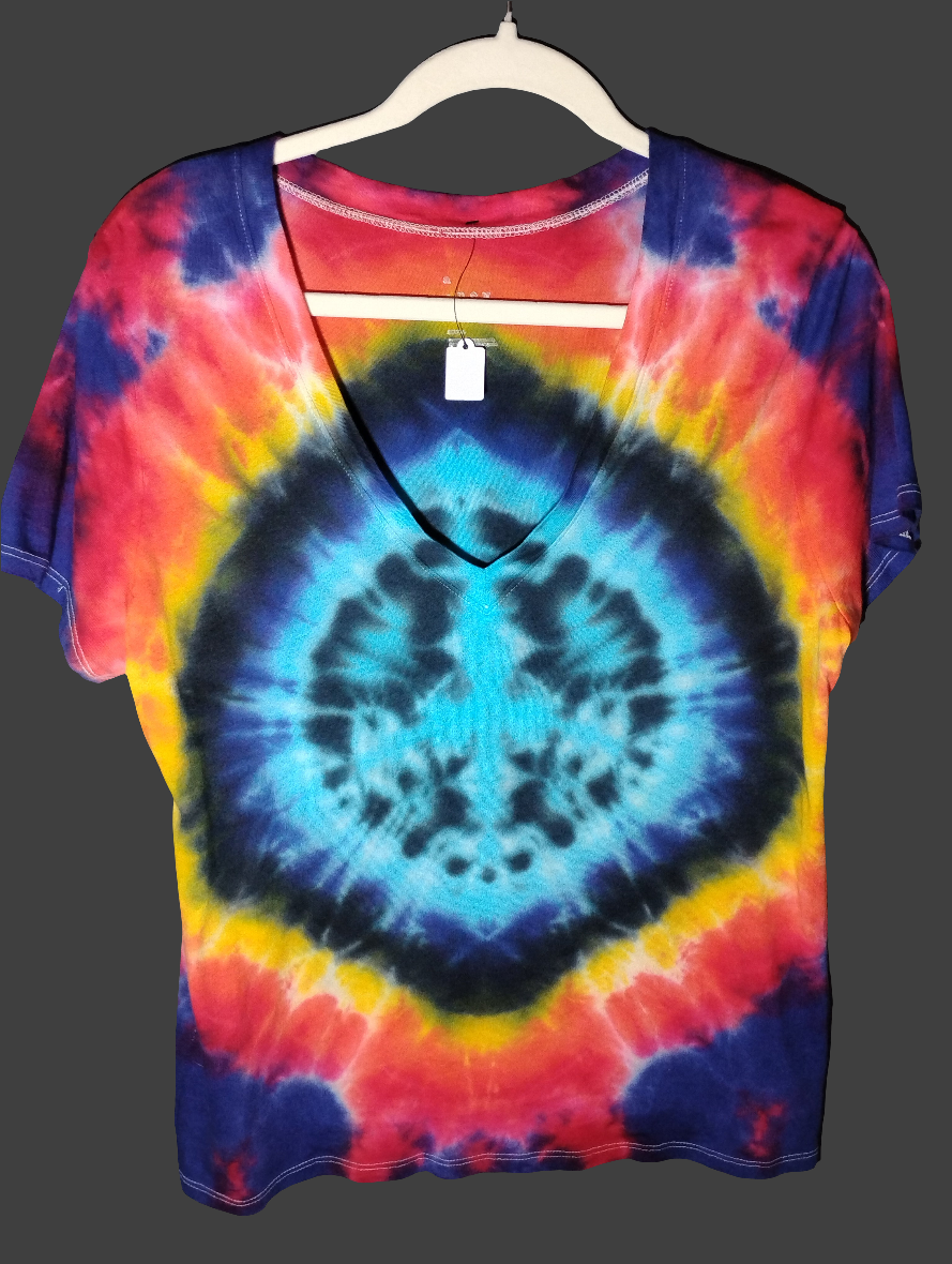 Ladies peace sign tie-dyed shirt in size small