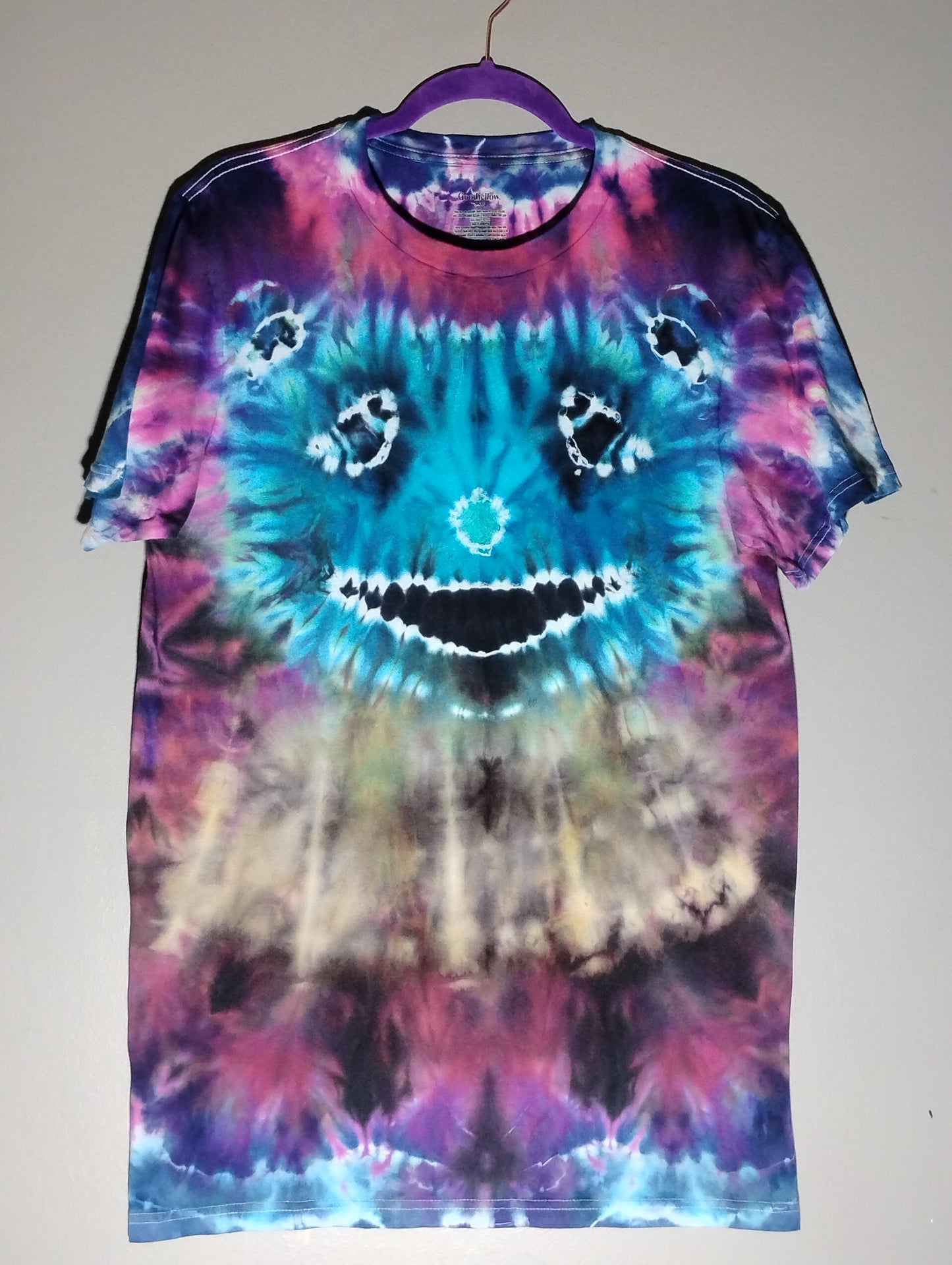 Bright blue guy with reverse tie dye neck ensemble size L