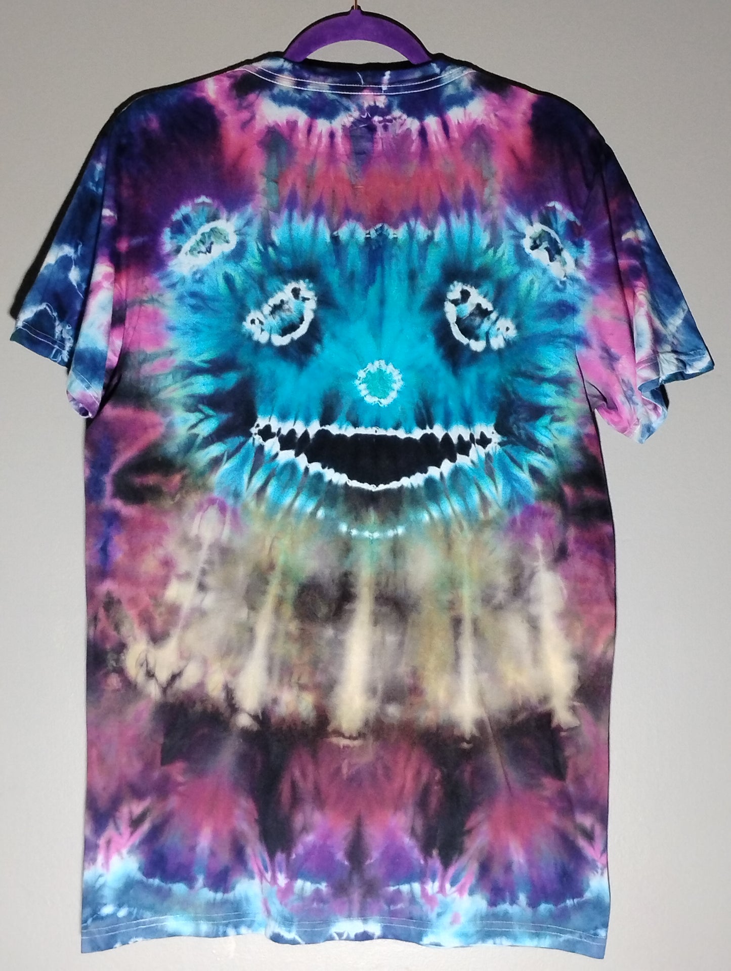 Bright blue guy with reverse tie dye neck ensemble size L